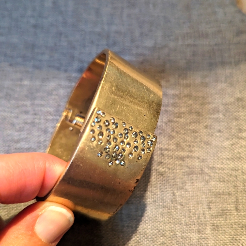 Kenneth Cole Gold Tone Smoke Crystal Inlay Hinge Cuff Style Bracelet